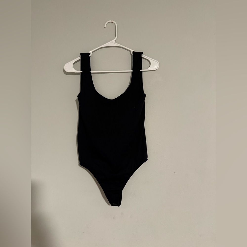 NWOT FREE PEOPLE BODYSUIT - NEVER WORN!